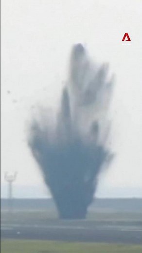 The moment an unexploded WWII US bomb blew up at an airport in Japan