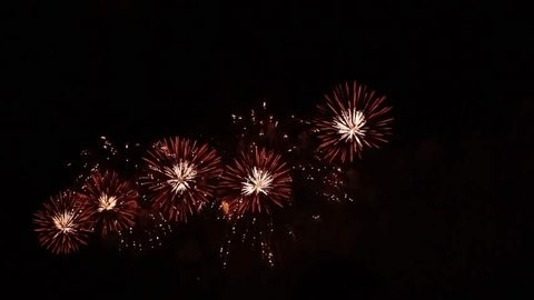 clip-3992367979-golden-sparkling-new-years-eve-fireworks-exploding