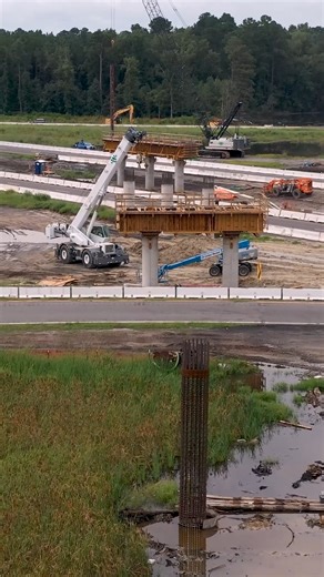 Progress continues at the I-26/I-95 Interchange Improvement project in Orangeburg County. Crews are installing massive reinforced concrete piers that will support the future bridge structures. These steel rebar cages are placed deep into the shaft and filled with concrete, to form the piers. | SCDOT