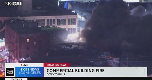 Commercial building fire continues to rage at textile warehouses in downtown LA