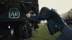 Cinematic shot of young girl running away from the problems of a free punk life
