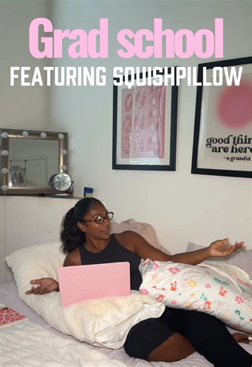 My bed has turned into a place for studying, scrolling, and surviving grad school with my @squishpillowofficial 🤍 #SquishPillowPartner