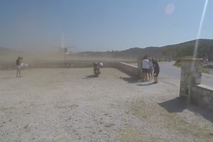 Tourists blown back from jet blast as plane takes off metres away