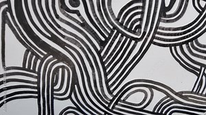 The image is a black and white drawing of a tree with many branches