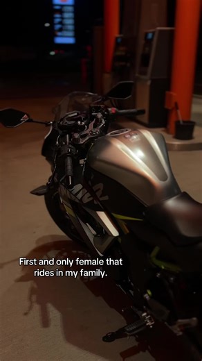 Female Motorcycle Rider in Family