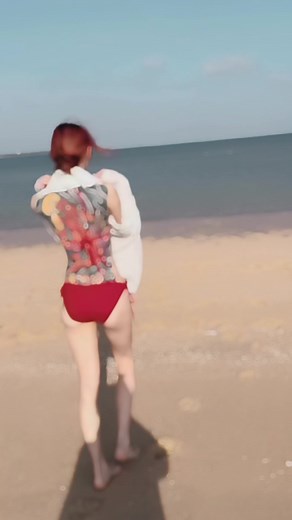 Stunning Beach Walk Showcasing Colorful Tattoo