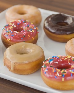 The chew & satiny glaze of freshly fried doughnuts is irresistible. Dan Souza shows you how to make homemade doughnuts that beat Krispy Kreme and Dunkin'. Watch on YouTube: https://bit.ly/3cXOV2a 🍩 | America's Test Kitchen
