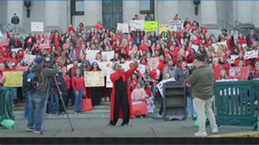 Hundreds rally in Olympia as the governor proposes cutting child care subsidy from 37,000 to 33,000 families. Parents say aid keeps them working and in school. | KING 5
