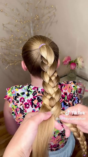 We needed a quick and easy ponytail hairstyle for the lake today! I love the added detail from braiding the center strand before braiding all of the hair together. It’s perfect for our active girlies! ⚽️🏃🏼‍♀️‍➡️🏀🤸‍♀️🏐 #kidshairstyles #hairtutorial #girlshairstyle #hairtok #ponytail #hairstyleideas #ponytailbraid #braids #hairinspo #longhair #hairoftheday #hair #easyhairstyle #braidstutorial #braiding