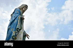 The Virgin Mary statue with moving clound on sky; Timelapse Stock Video Footage - Alamy