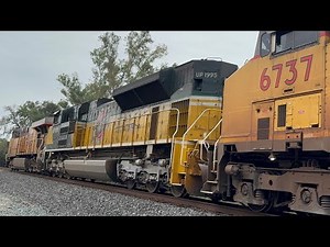 UP 8644 leads a power move with UP 1995 CNW heritage units