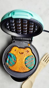 l made a cute orange and blue frog mini protein waffle 🧡💙🐸🧇 Ribbit! 🐸 #waffles #miniwaffles #waffels #wafflehouse #proteinwaffles #waffleswaffleswaffles #wafflicious #waffleart #messyfun #colorfulfood #miniwafflemaker #wafflemaker #ilovewaffles #wafflelove #waffletime | Spiced Up Mom