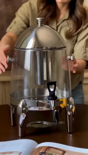 Don't just serve—impress! This versatile dispenser handles any beverage, from iced lemonade to mulled wine. ✨ Featuring dual alcohol burners and a central ice tube for total temperature control. Your go-to for every party! | Antonio Rodriguez | Facebook