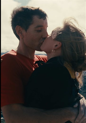 Alex Honnold and his wife Sanni kiss atop Taipei 101 after he completed his historic free solo climb #SkyscraperLIVE