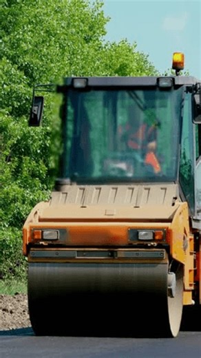 clip-4024906721-repair-highway-roller-compactor-machine--asphalt