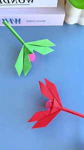 Title: Let's Make a Paper Dragonfly 🐉✨ Hashtags: #PaperDragonfly #OrigamiCraft #PaperArt #DIYDragonfly #EasyCraft #CreativePaper #HandmadeCraft #CraftingFun #SimpleDIY #PaperInsects | paper craft ideas