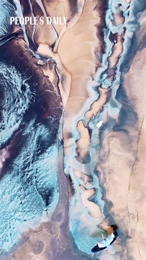 30K views · 189 reactions | Experience the mesmerizing tidal patterns of the Qiantang River in E China's Zhejiang Province as a white crane adds a touch of gracefulness to the captivating scene. | People's Daily, China | Facebook