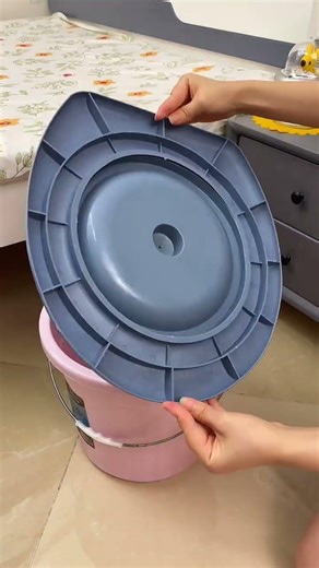 Portable toilet by bed ensures safety for elderly and peace of mind for children