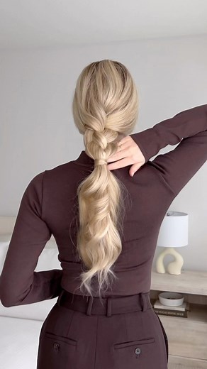 Alex Gaboury on Instagram: "This braid is much easier than it looks, and that’s why it’s one of my favourites.❤️ Steps: Begin by creating 4 equal sections. Loosely hold your 2 left sections in your left hand. Take your far right section and weave it through. Weave over your 3rd, under your 2nd, and over your 1st section, and repeat. I did a total of 4 passes, securing when finished. Pinch + pull the outside of your braid for volume. Let me know if you try this!✨ #easyhairstyles #braidedponytail