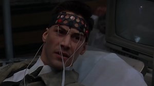 26 years ago today, Johnny Mnemonic gave us a peek into 2021! Keep it or flush it? | Dueling Decades