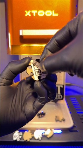 Mini puzzle laser engraving on black acrylic