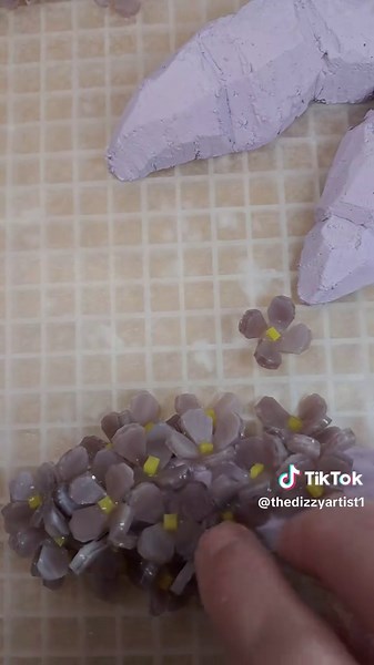 Have been working on some 3D Mosaic lilac patterns for a few months. The first looked like a purple turd 😆. But this one is MUCH better !#art #mosaic #flower #mosaicart #fyp