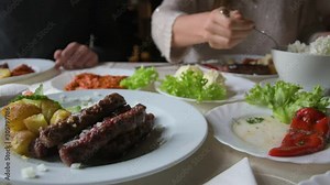 Traditional Serbian Balkan food meet potato salad