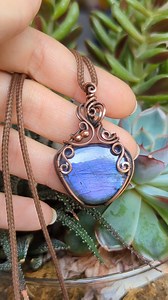 5.6K views · 101 reactions | Such a beautiful purple Labradorite! This piece is all finished and will be available in Sunday's shop update. #purplelabradorite #labradoritejewelry #wirewrappedpendant #wirewrap #oxidizingcopper | OxanaCrafts | Facebook
