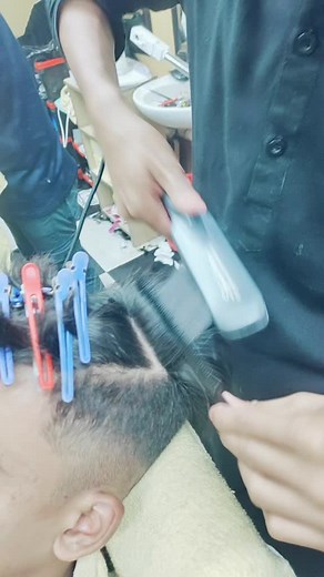 Haircut Tutorial: Watch a Barber's Styling Techniques