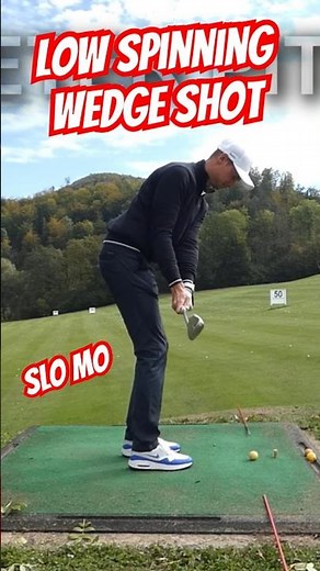 Low spinning wedge shot in slow motion