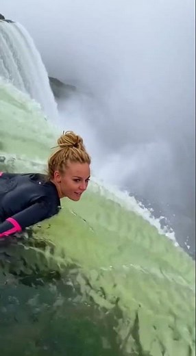 Fictional Footage: Lady swimming on the Edge of a Huge Waterfall 🌊⚠️ Do not Attempt this.