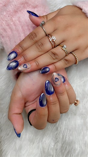 Nail It with Shanaya Kasturi on Instagram: "Korean extension with blue cat eye and beautiful heart with chrome art❤️ For appointment dm us or call 8269000008 #nails #cateye #newlook #shills #shillsproffesional❤️"