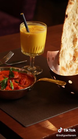 Enjoy Delicious Curry with Naan and Mango Lassi