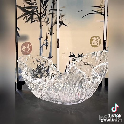 Water splash bowl. New creation. This actually started life as the base layer for a large heart memorial I’m working on but I poured it too deep and so…. I took it out of the mould when it was still bendy and popped it in a dish to create this shape. The I added a rub of pixie glitter and resin on the outside just to add sparkle. Something happy made from a mistake 殺拾. I added the little padded feet… I kinda like them but I’m not 100%. | STK Design GB | Facebook