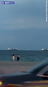 Man terrified as 'UFO' soars through thunderstorm at Florida beach