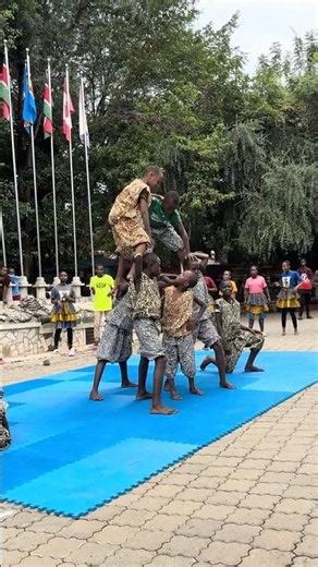 Amazing Kenyan Child Acrobats Build a Human Tower!