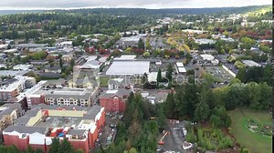 Cinematic 4K aerial dolly drone footage of commercial and residential areas of downtown, Town Center of Woodinville, an upscale, affluent Seattle neighborhood near Bothell in King County, Washington Stock Video
