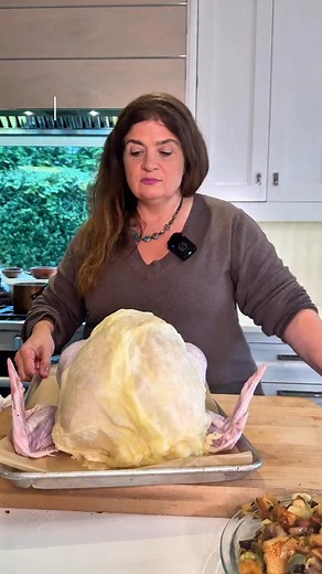 My secret to avoiding a dry Thanksgiving turkey: Butter soaked cheesecloth. The full How to Cook a Turkey video is on my Youtube channel linked in my bio! #thanksgiving #turkey #howtocookaturkey #thanksgivingdinner #cooking | Alex Guarnaschelli