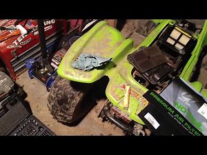 How To Change A Battery, and Air Filter On A 2004 Arctic Cat 90