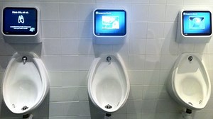 Toilet technology targets boredom in the men's urinals