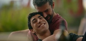 MICHELE & MASSIMO - On Gay Storylines Gay Storyline from the TV series "THE IGNORANT ANGELS" (LE FATE IGNORANTI) Drama Italy 2022. Michele (Eduardo Scarpetta) is a painter and set designer at the Opera House in Rome. He lives on the top floor of a building in a working-class area of the city. Every Sunday, Michele's extended family has parties on the terrace. They are all uninhibited, but sometimes they fear speaking about their feelings. One day Michele meets Massimo (Luca Argentero) in a books