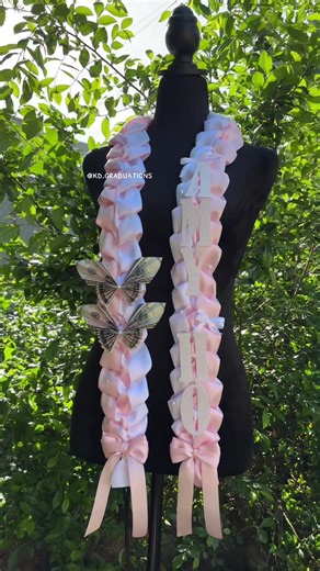 This is a pink white lei with name on it, you can find it under “coquette lei” and customize it from there 🎀 #kdgraduations #graduation #classof2024 #graduated #2024 #moneylei #leis #lei #moneyleis #fyp #foryoupage #viral #graduate #giftsforgraduates #highschool #university #smallbusiness #california #college #stole #sash #graduationgiftideas #graduationseason #capcut #grad #graduate #ribbonlei #coquette #pink #bows