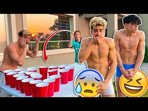 WE THROW BALLS INTO GLASSES (IF YOU LOSE YOU TAKE OFF YOUR CLOTHES !!)