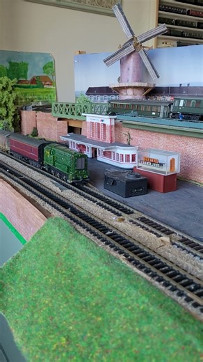 OO Hornby 4-6-2 BR 34066 "Spitfire" with a passengerstrain, 0-6-0 BR class 08 with a goodstrain,