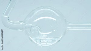 Flask witn water. Eco-friendly lab-tested cosmetics. Sustainable and cruelty-free formulations. Getting extract. Naturally effective personal skin care and body care products.