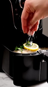 Air Fryer Chilean Sea Bass with Lemon & Herbs Ingredients 2 Chilean sea bass fillets (5–6 oz each) 1½ tbsp olive oil or melted butter Zest of ½ lemon lemon slices 1 tsp fresh parsley (or dill/thyme) ½ tsp garlic powder Salt & pepper Steps Pat fish dry. Brush with oil/butter. Season with salt, pepper, garlic, lemon zest, and herbs. Place in air fryer (skin-side down if skin-on). Air fry at 375°F (190°C) for 10–12 min (flakes easily, opaque center) Finish Fresh lemon squeeze Optional drizzle of bu