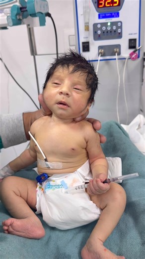 Baby hold syringe tightly 🥰 #baby #cutebaby #docter #cute #afterbirth #feeding #newborn | Docter Indu