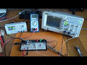 Inverting op amp setup and detailed breadboard layout (inverting a square wave signal).