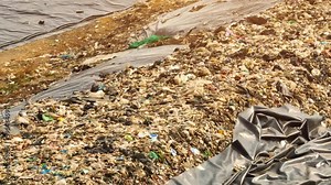 A landfill is a designated area for the disposal of waste materials by burying them in the ground. It is a common method of waste management, but can contribute to pollution and environmental. 4K Stock Video