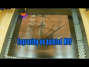 Laser engraving on painted MDF.